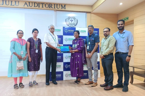 Dr. Govardhanam Sowjanya, DNB Radiation Oncology III Year Trainee receiving Commendation from NBEMS for her outstanding research work in Thesis submission in Clinical Society Meeting on 08.03.2025 at GKD Auditorium